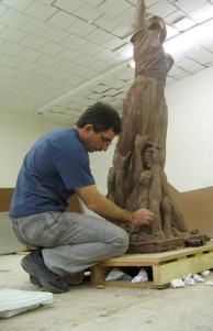 Ahmed works on his other profession, creating a sculpture for Elon University. Photo courtesy of Tom Arcaro.